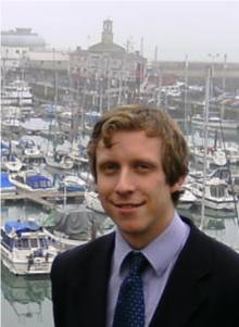 photo of new staff in front of harbour